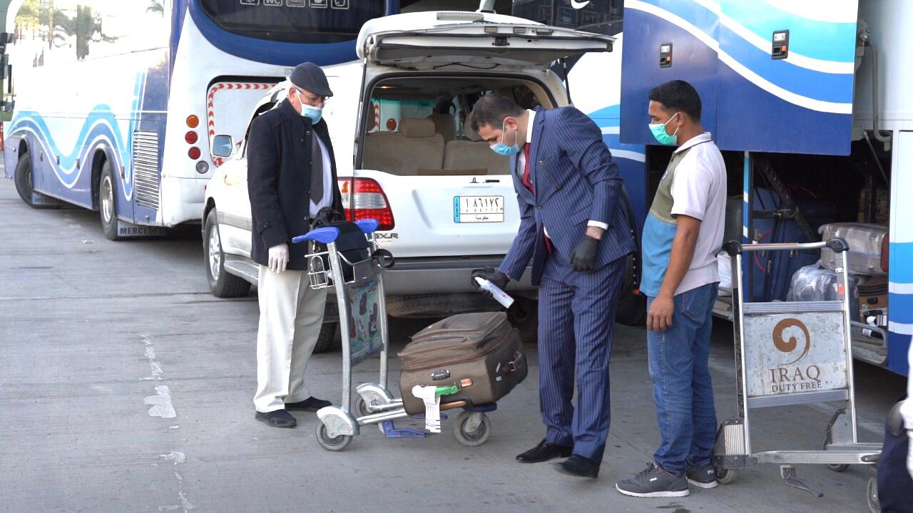 العراق يوجه بتوفير حافلات لنقل العائدين من مصر الى محافظاتهم مجانا